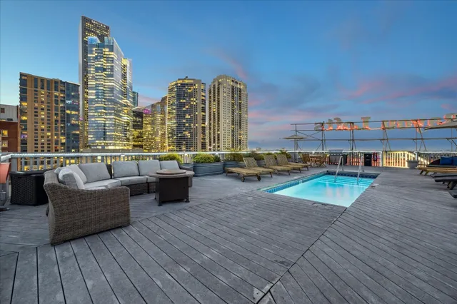 a view of roof deck with patio