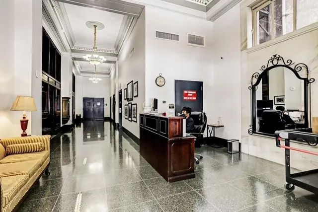 a living room with furniture gym equipment and a view of living room