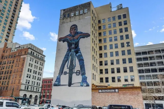 a view of a building with a street