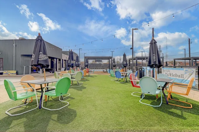 a view of a swimming pool with sitting area