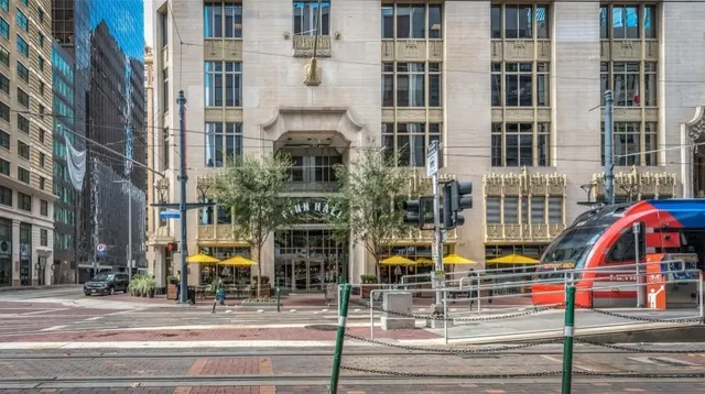 a front view of a building with street view