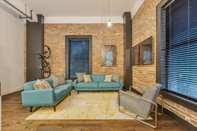 a view of patio with couch and a potted plant