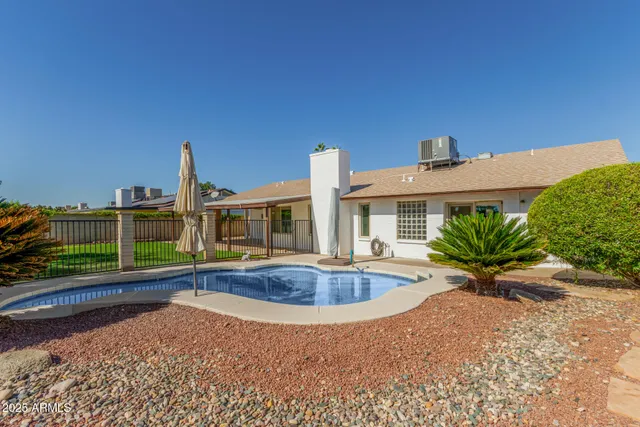 a view of a house with a swimming pool