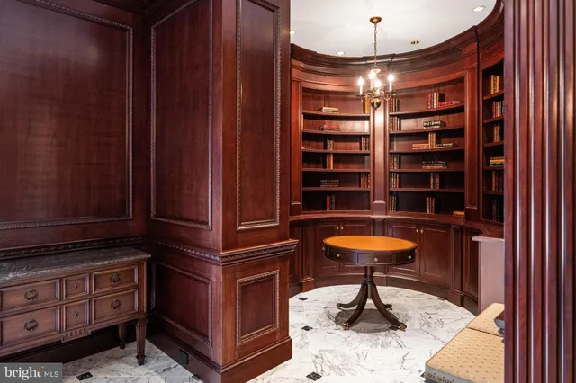 a room with furniture and chandelier