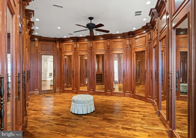 a swimming pool with a outdoor seating and yard