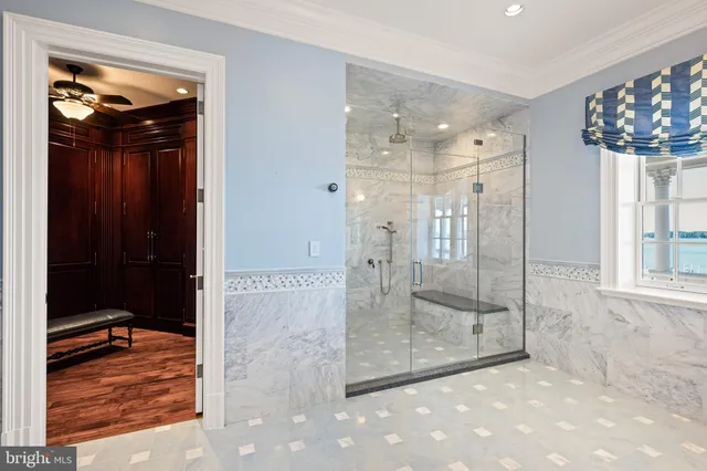 a view of a bathroom from a hallway