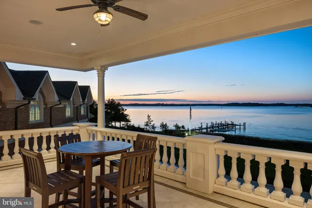 a view of a chairs and table in patio