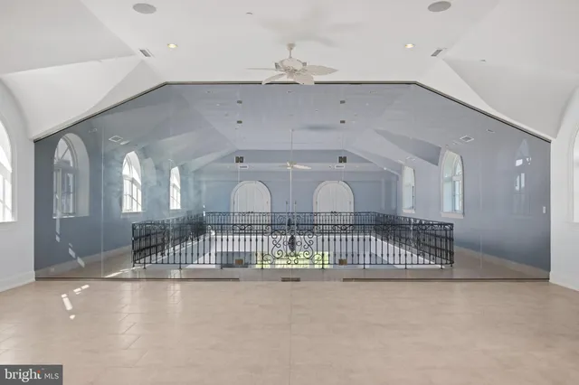 a view of a room with wooden walls