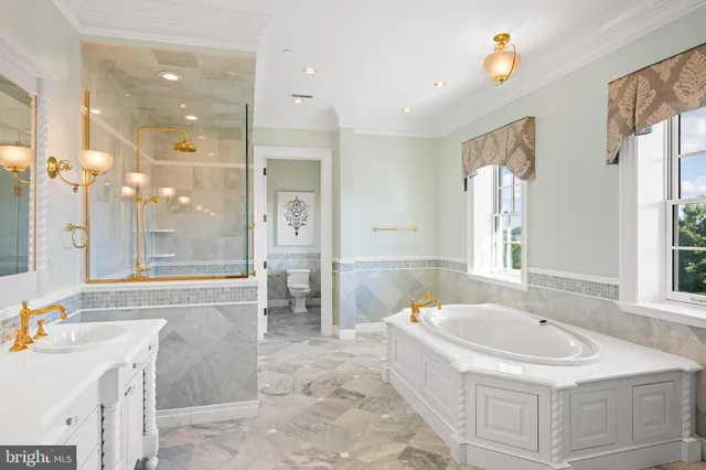 a view of a livingroom with furniture and a flat screen tv