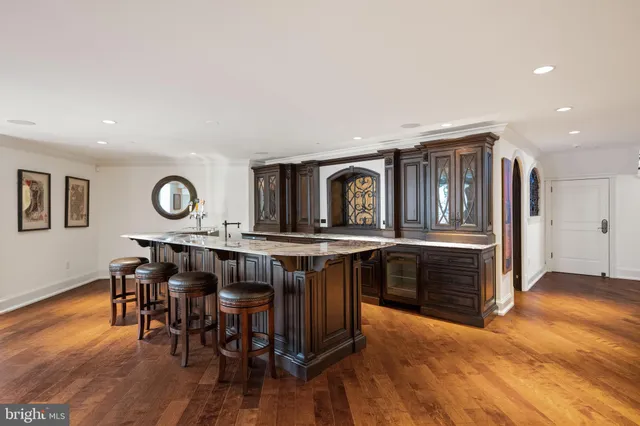 a front view of a house with chairs