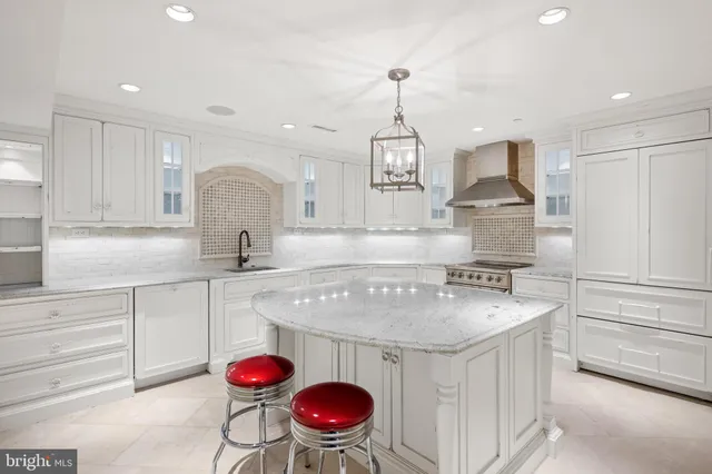 a view of kitchen with furniture and wooden floor