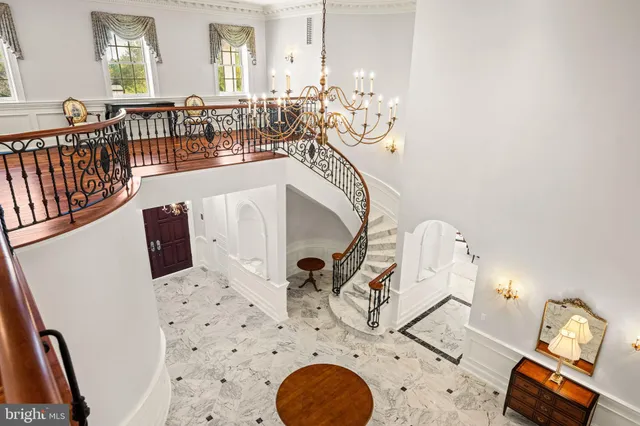 a view of living room with furniture and wooden floor