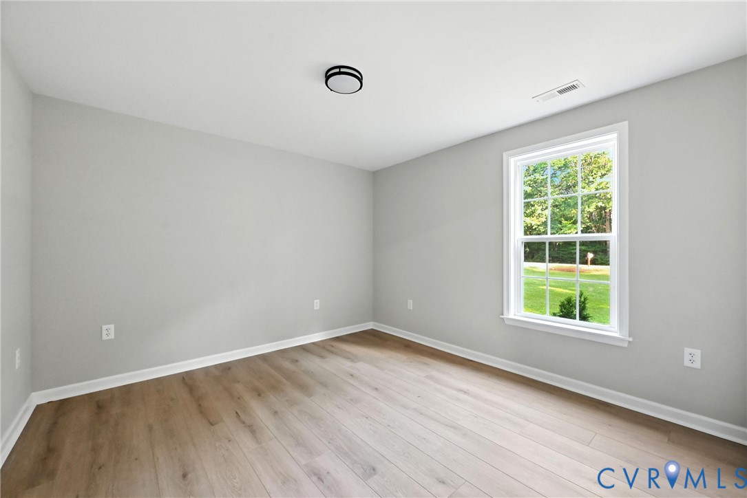 24611 Williamson Road Dinwiddie, VA 23841 - Photo 21 of 30 a view of a room that has a window in it