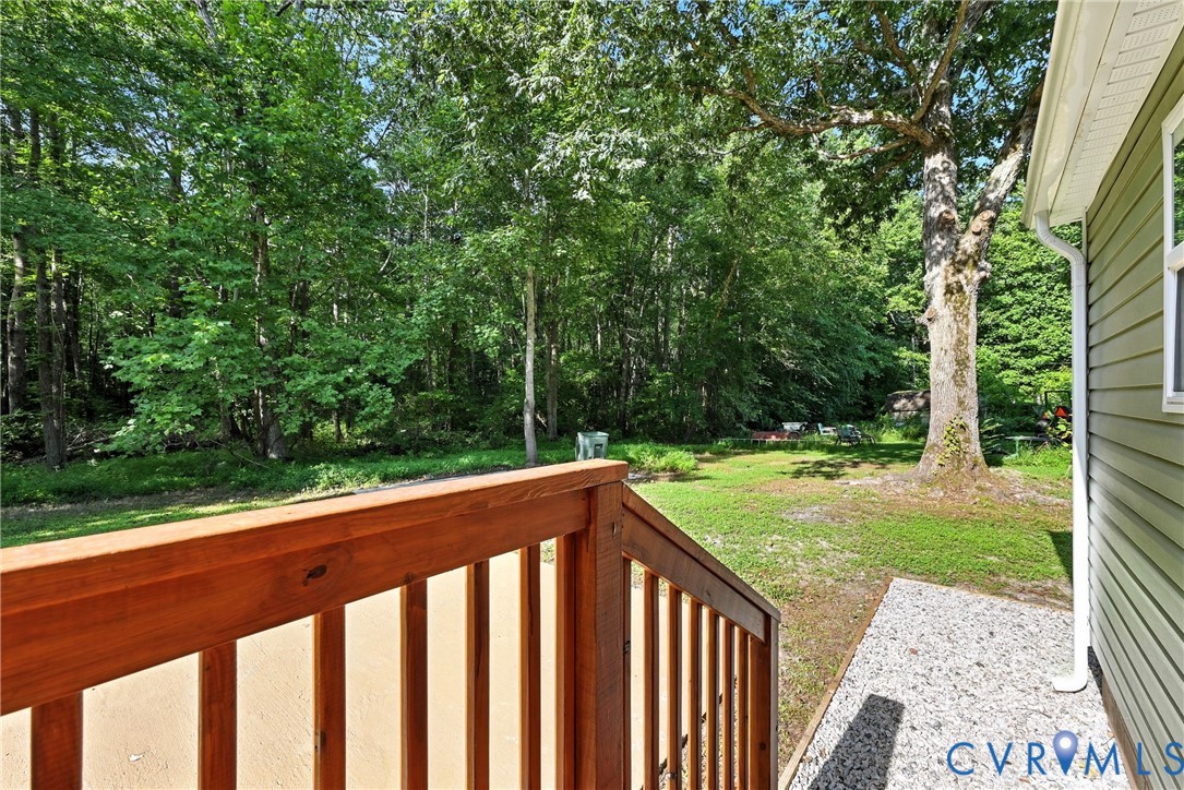 24611 Williamson Road Dinwiddie, VA 23841 - Photo 27 of 30 a view of a backyard with large trees