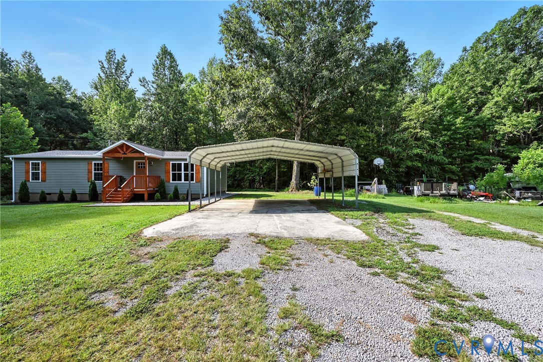 24611 Williamson Road Dinwiddie, VA 23841 - Photo 3 of 30 a front view of house with yard and green space