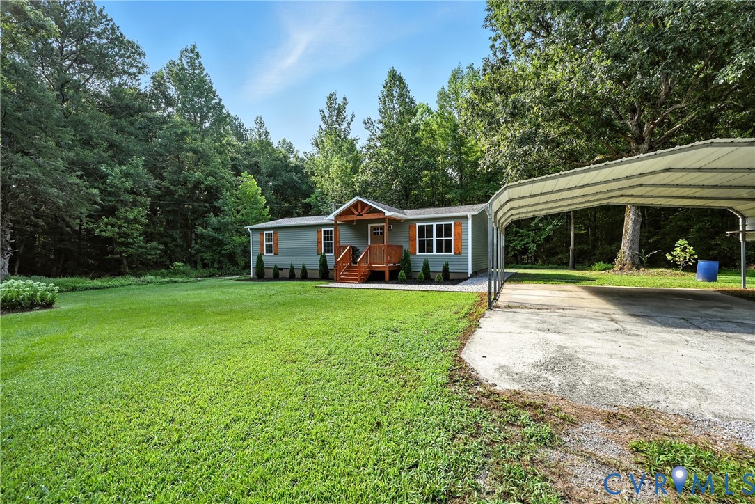 24611 Williamson Road Dinwiddie, VA 23841 - Photo 5 of 30 a front view of house with yard and green space