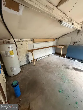 a view of storage and utility room with utility room