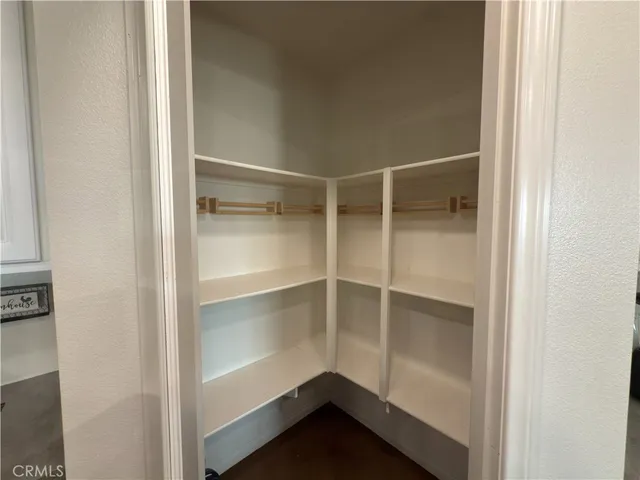 a view of an empty walk in closet