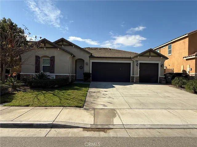 a house view with a garden space
