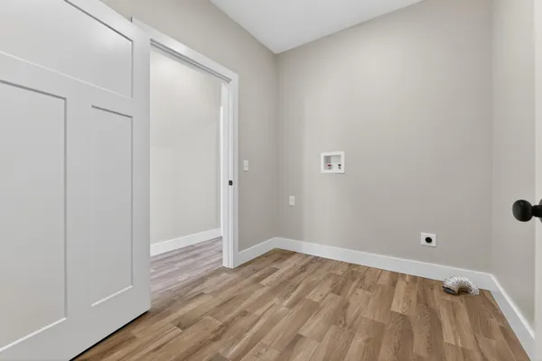 a view of a livingroom with a ceiling fan and window