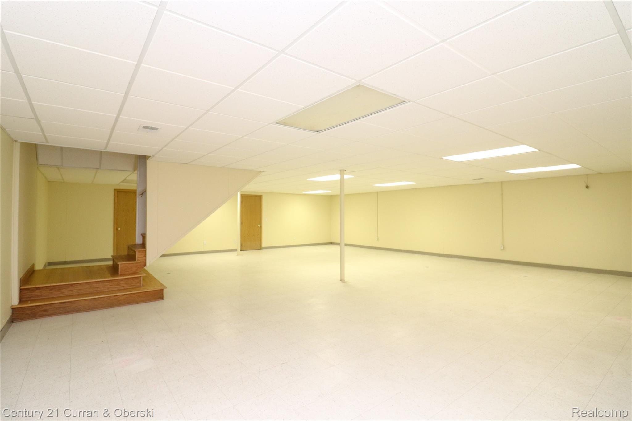 14711 Haggerty Road Belleville, MI 48111 - Photo 37 of 58 Huge open finished basement