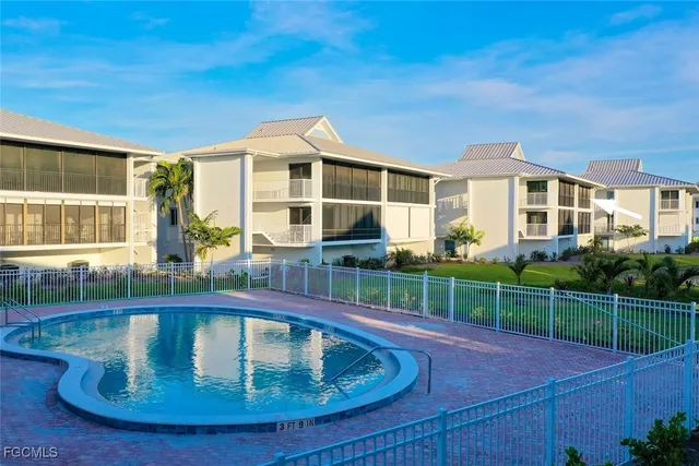 a view of a house with a swimming pool