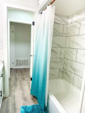 a bathroom with a bathtub