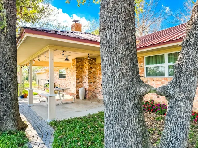 an outdoor view with swimming pool and ocean view