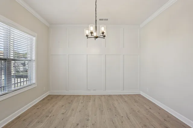 a bathroom with a toilet a sink and a mirror