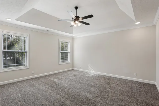 a bathroom with double vanity sinks and two mirror