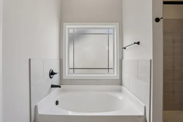 a view of a room with rack on the wall