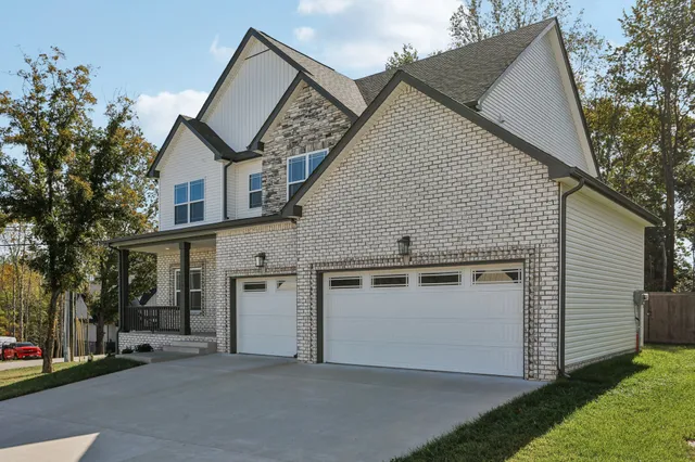 a view of a house with a garage