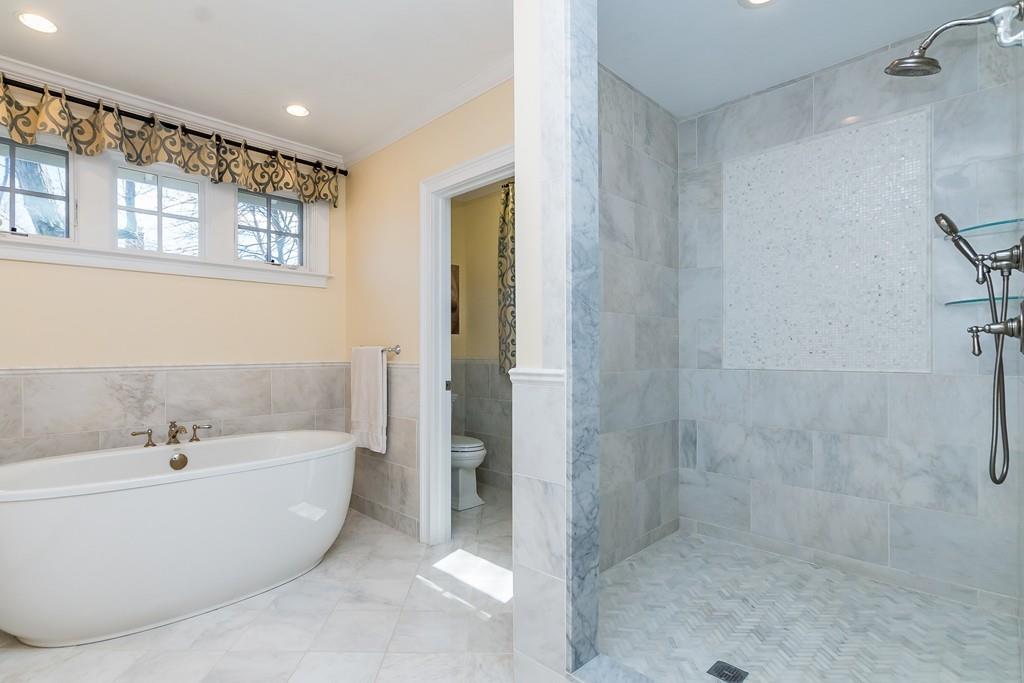 12 Vineyard Road Newton, MA 02459 - Photo 16 of 26 a bathroom with a bathtub and shower