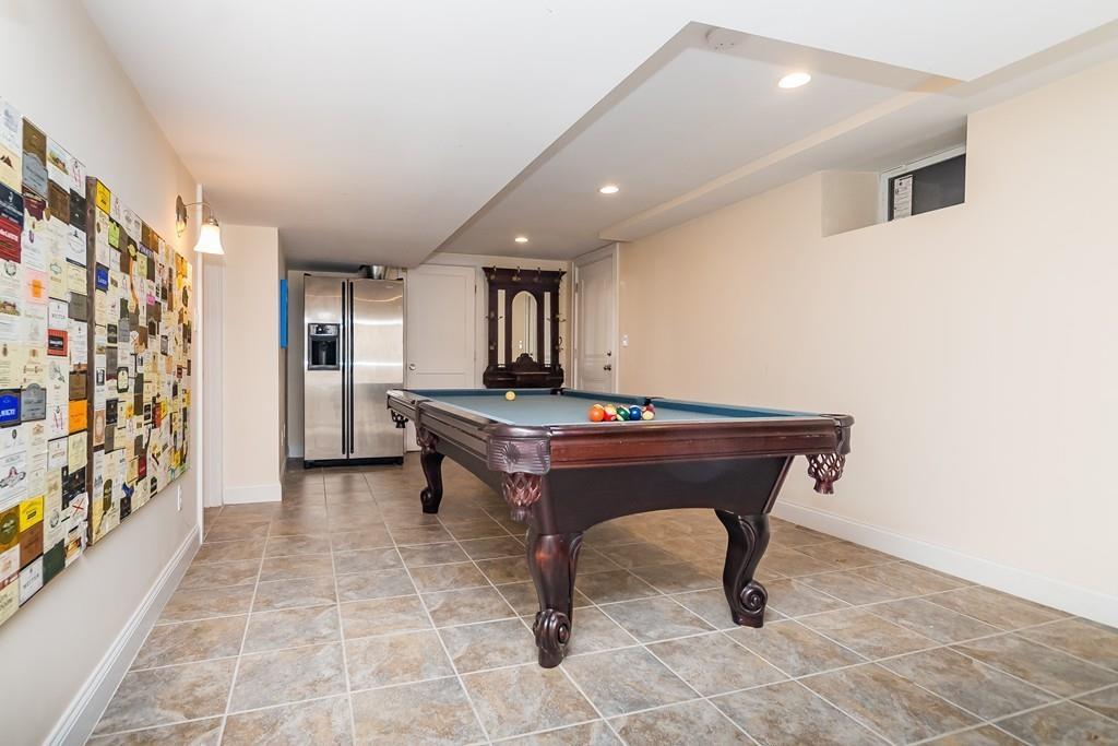 12 Vineyard Road Newton, MA 02459 - Photo 21 of 26 a room with furniture pool table and windows