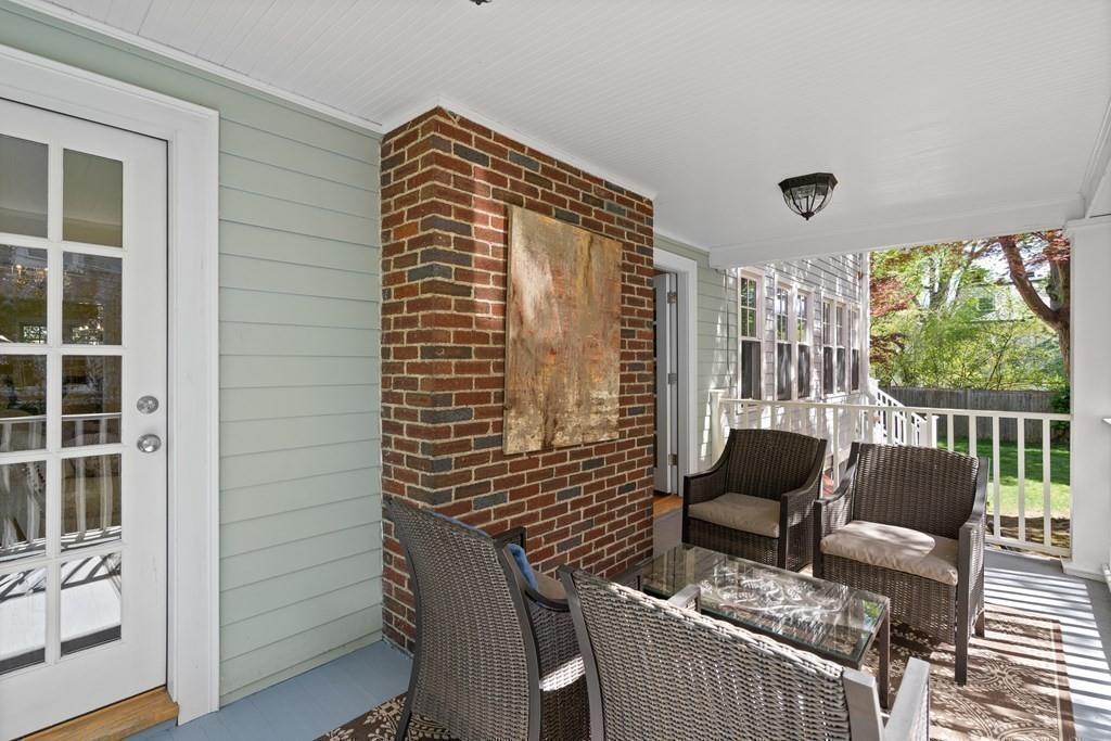12 Vineyard Road Newton, MA 02459 - Photo 24 of 26 a view of a livingroom with furniture and garden