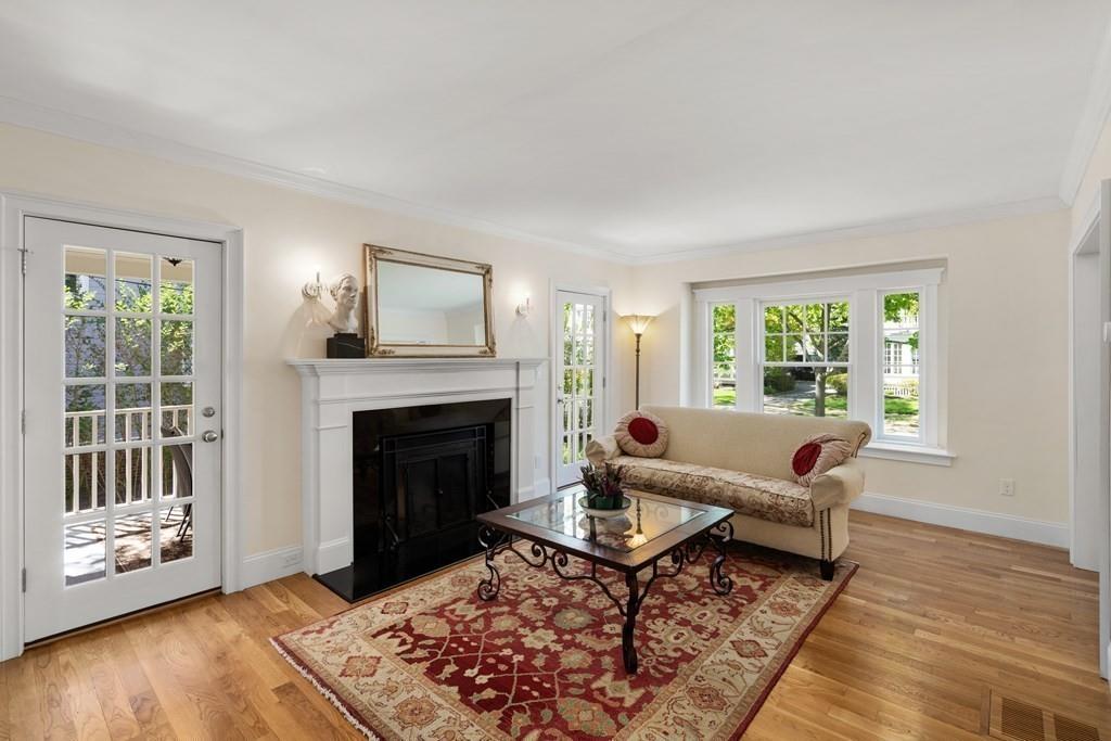 12 Vineyard Road Newton, MA 02459 - Photo 3 of 26 a living room with furniture and a fireplace