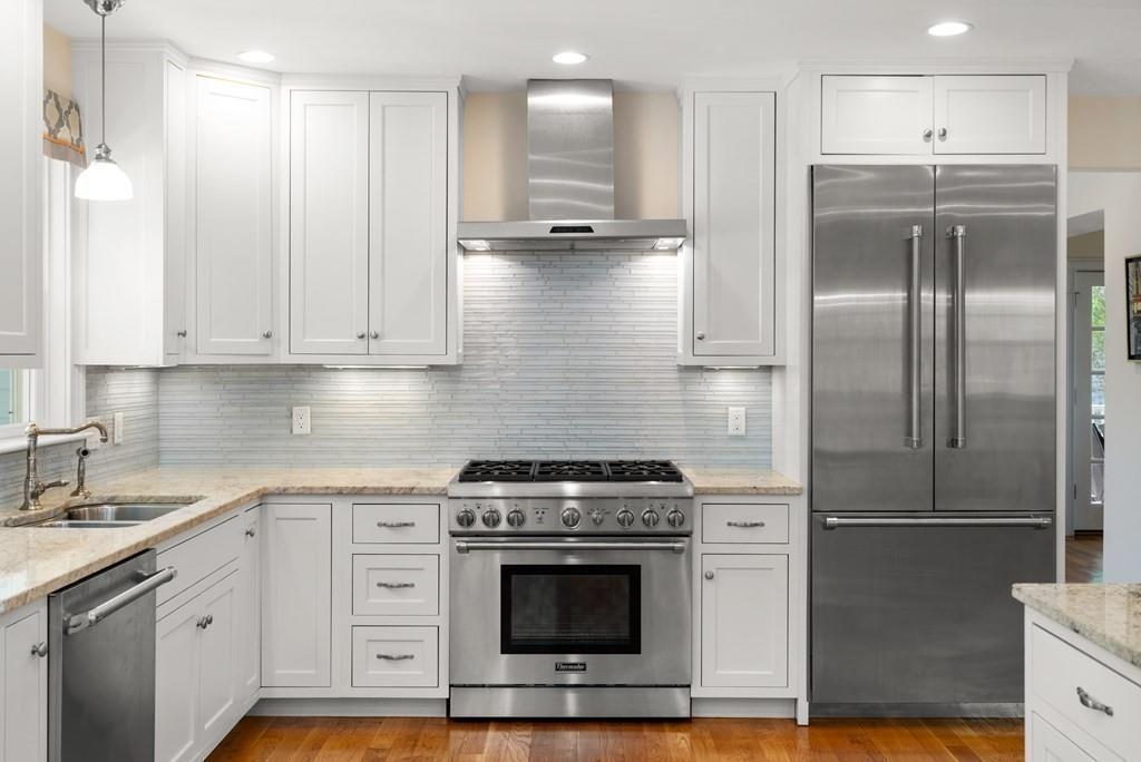 12 Vineyard Road Newton, MA 02459 - Photo 6 of 26 a kitchen with a stove and a refrigerator