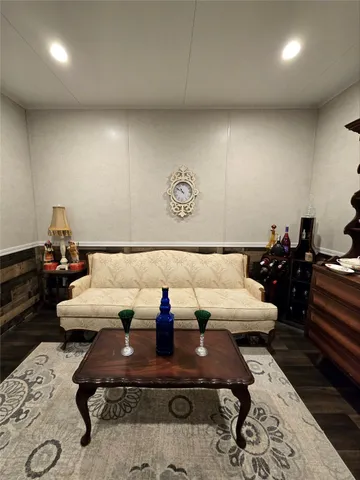 a living room with furniture and a table