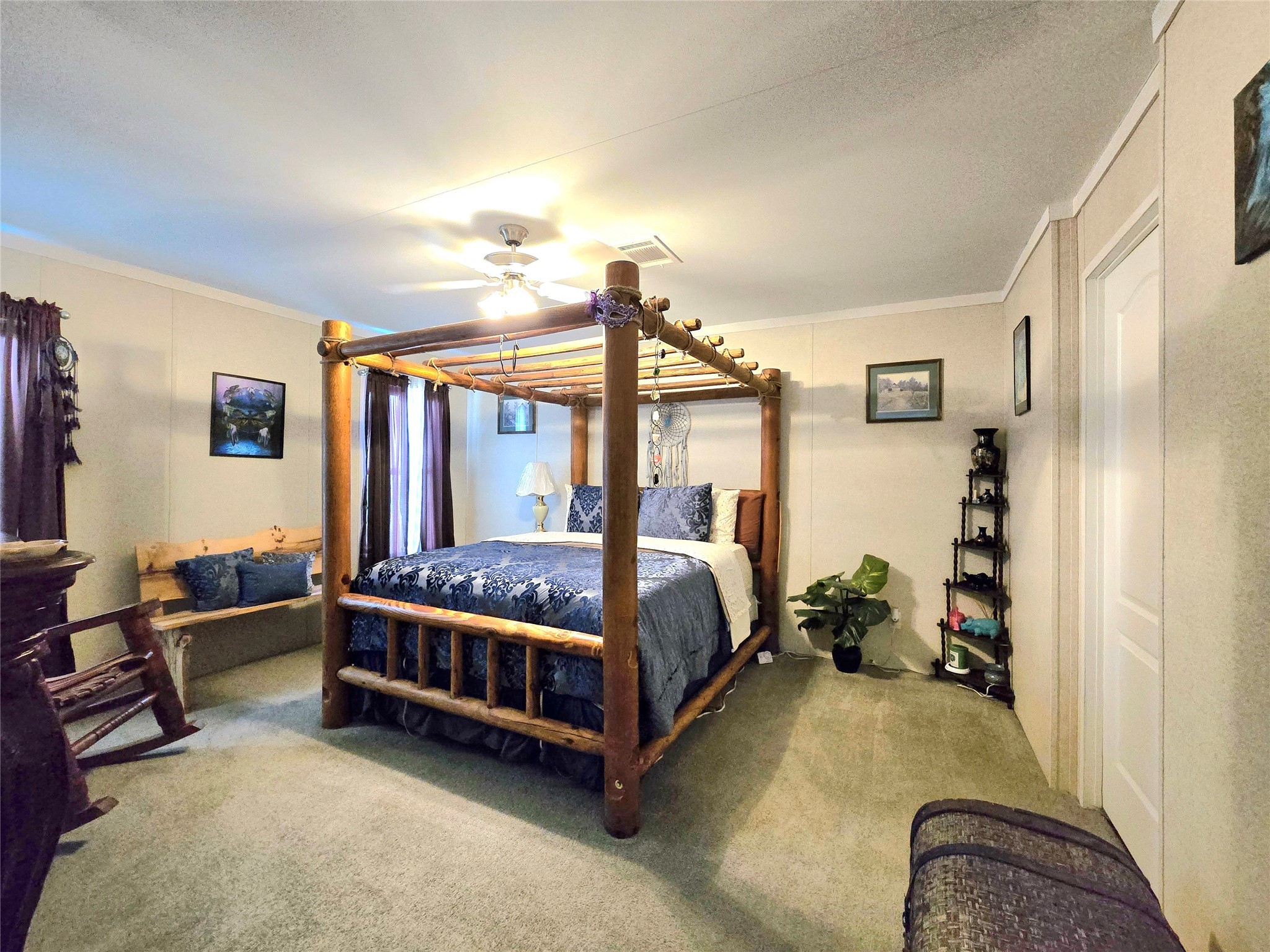 223 County Road 2167B Cleveland, TX 77327 - Photo 21 of 50 a bedroom with bed and a window