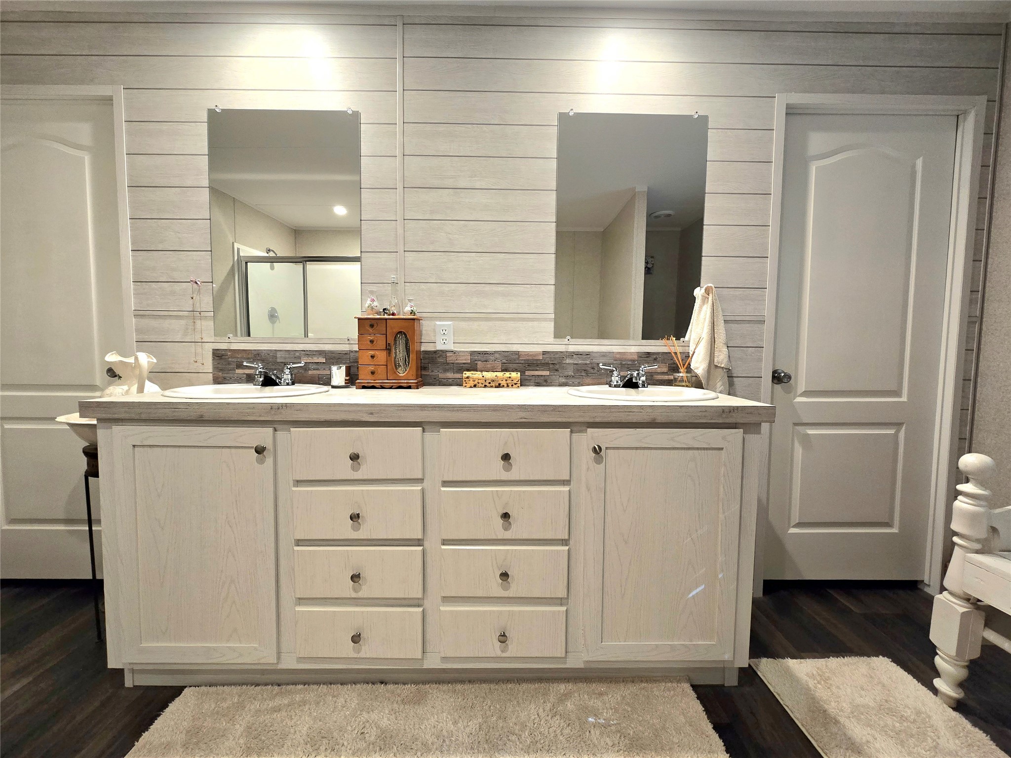 223 County Road 2167B Cleveland, TX 77327 - Photo 23 of 50 a bathroom with a sink and a mirror