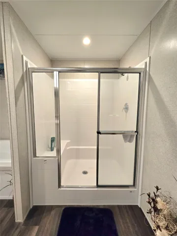 a bathroom with a sink toilet and mirror