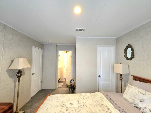 a view of a yard with furniture and a garden