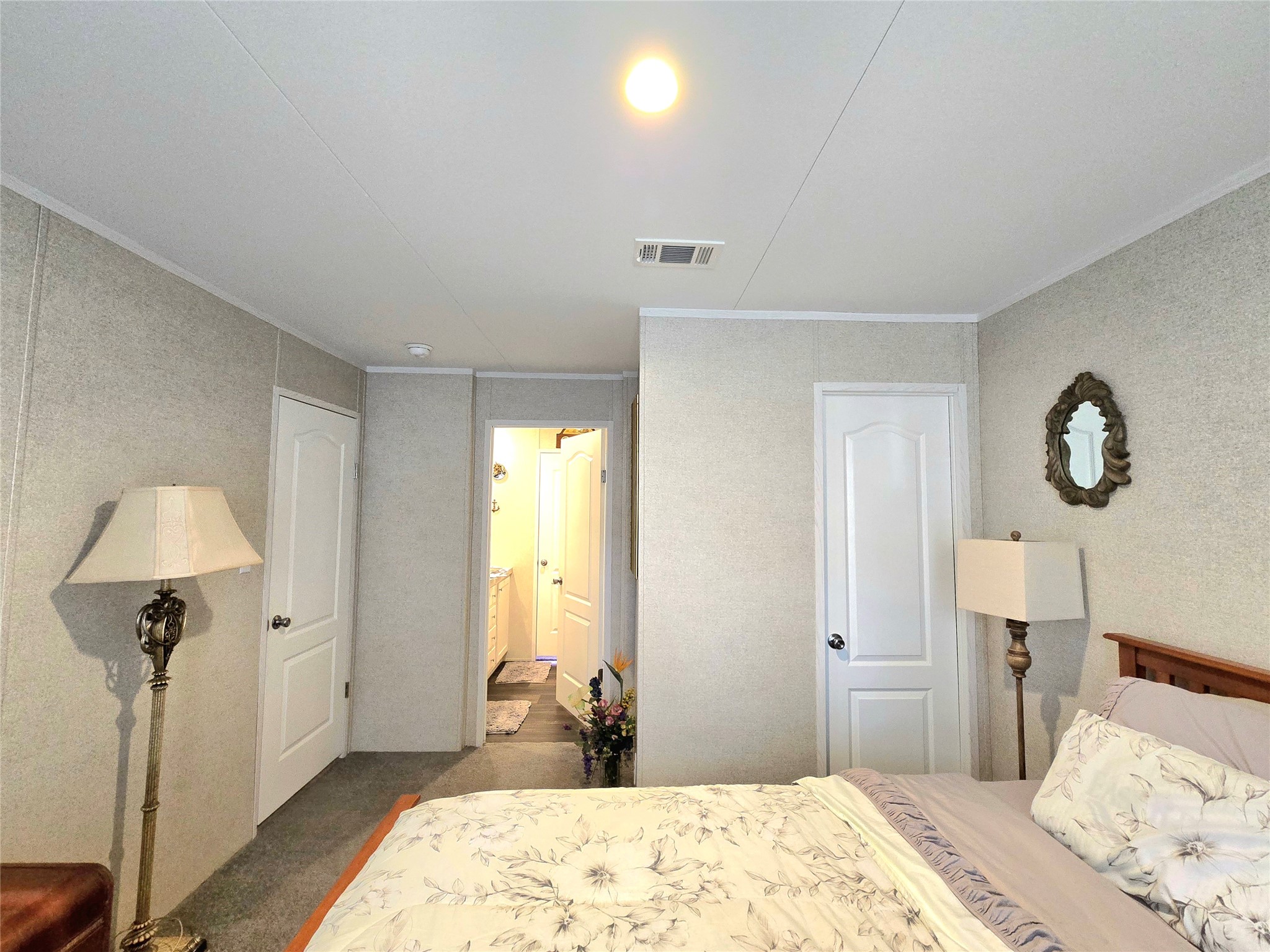 223 County Road 2167B Cleveland, TX 77327 - Photo 30 of 50 a bedroom with a bed and a dresser