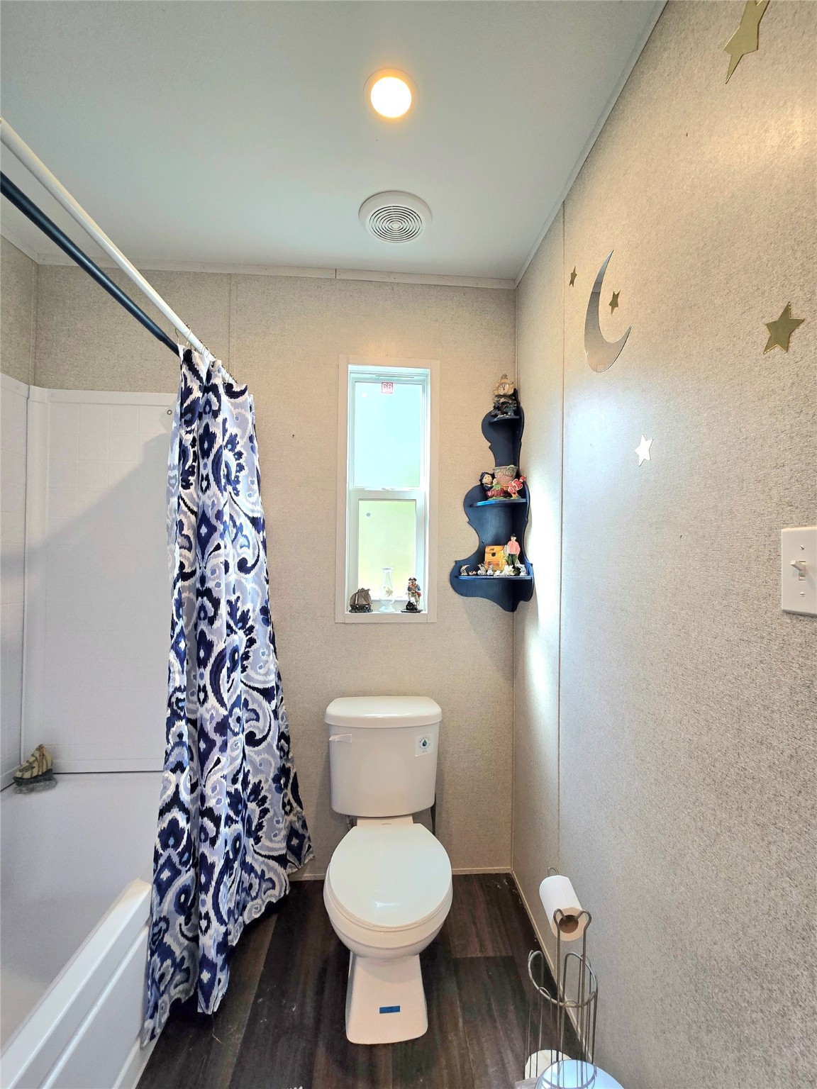 223 County Road 2167B Cleveland, TX 77327 - Photo 31 of 50 a bathroom with a toilet a sink and a shower