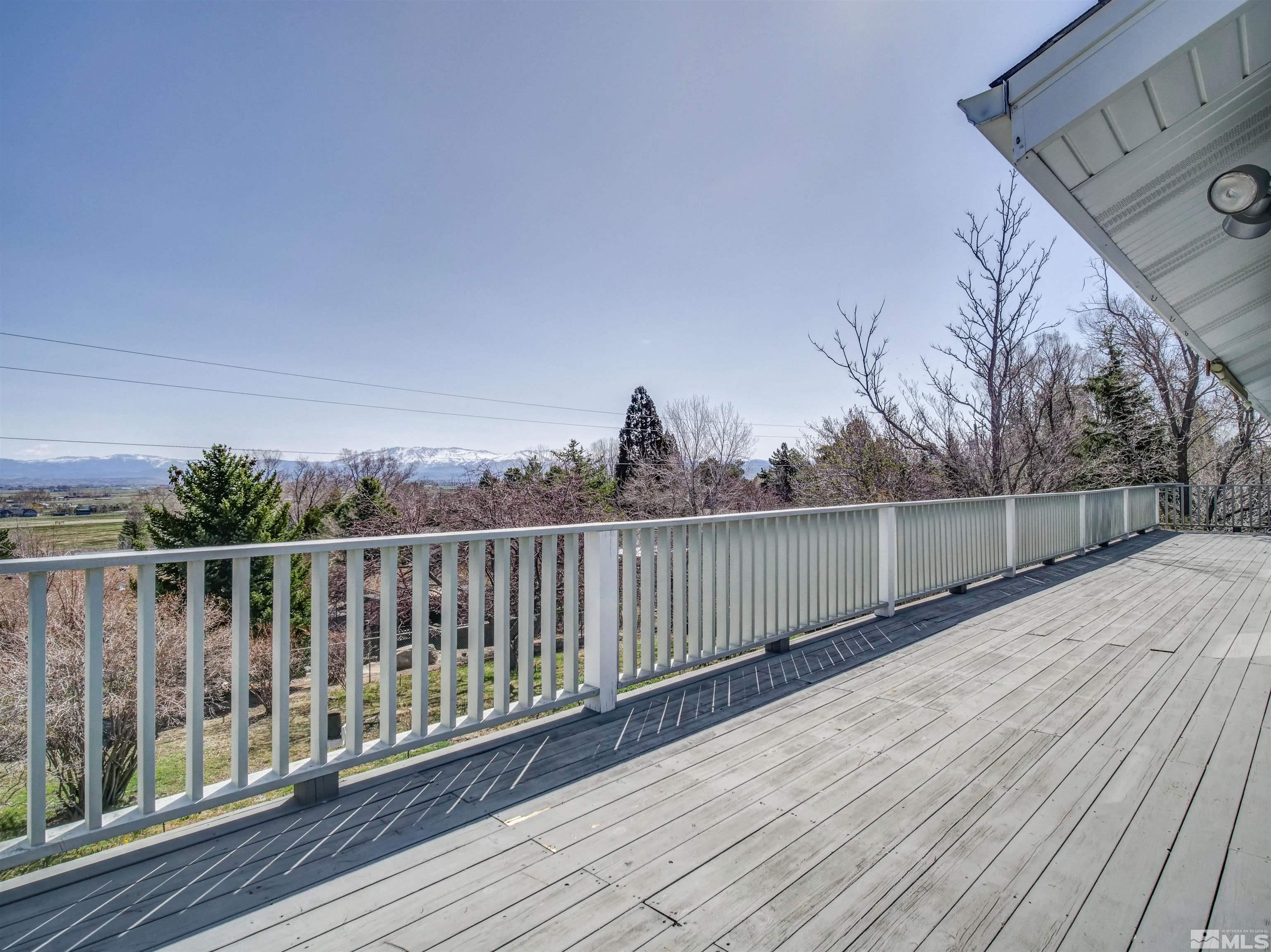 875 Bollen Circle Gardnerville, NV 89460 - Photo 16 of 26 a view of balcony with wooden floor
