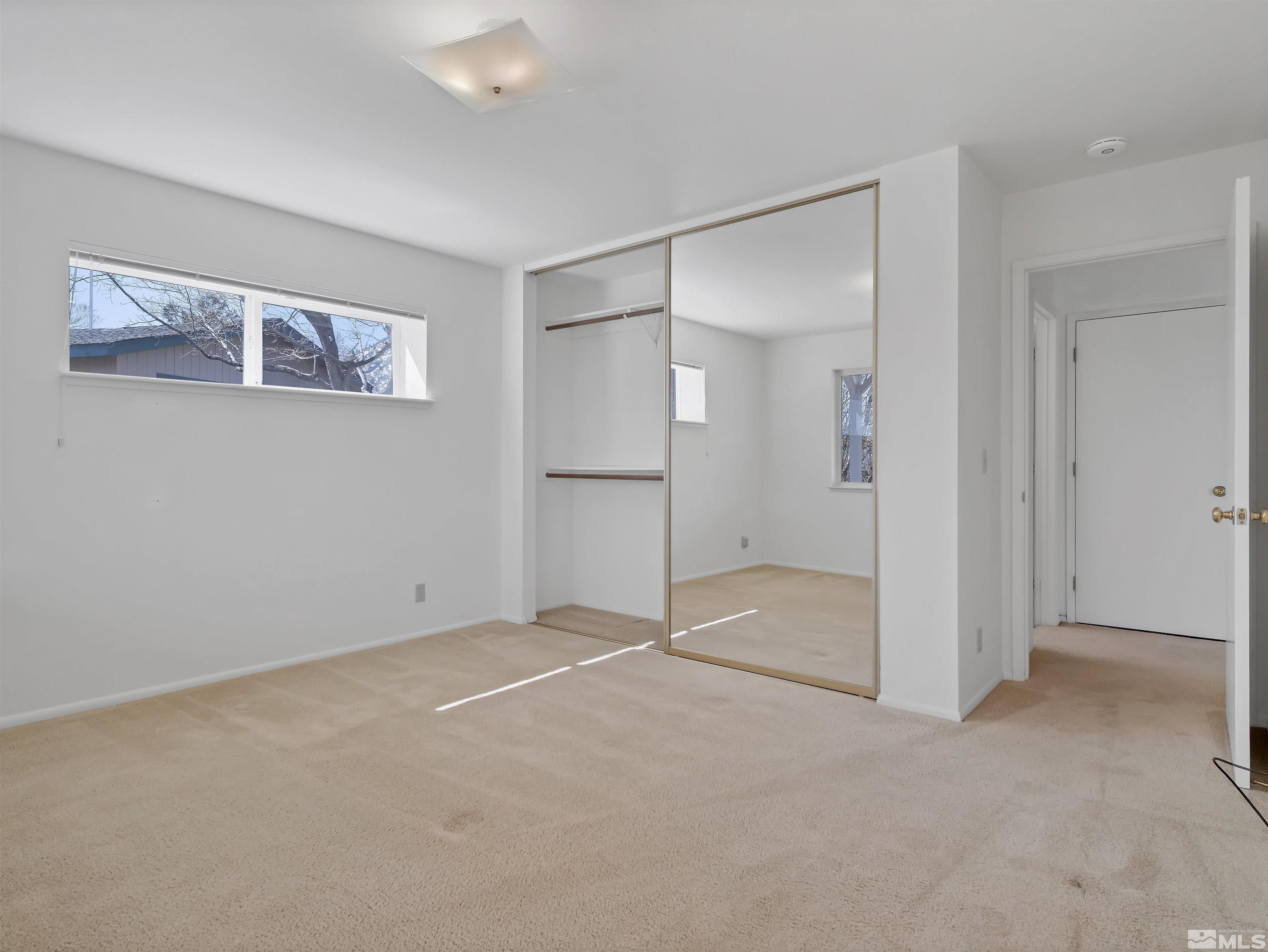 875 Bollen Circle Gardnerville, NV 89460 - Photo 19 of 26 an empty room with a bathroom