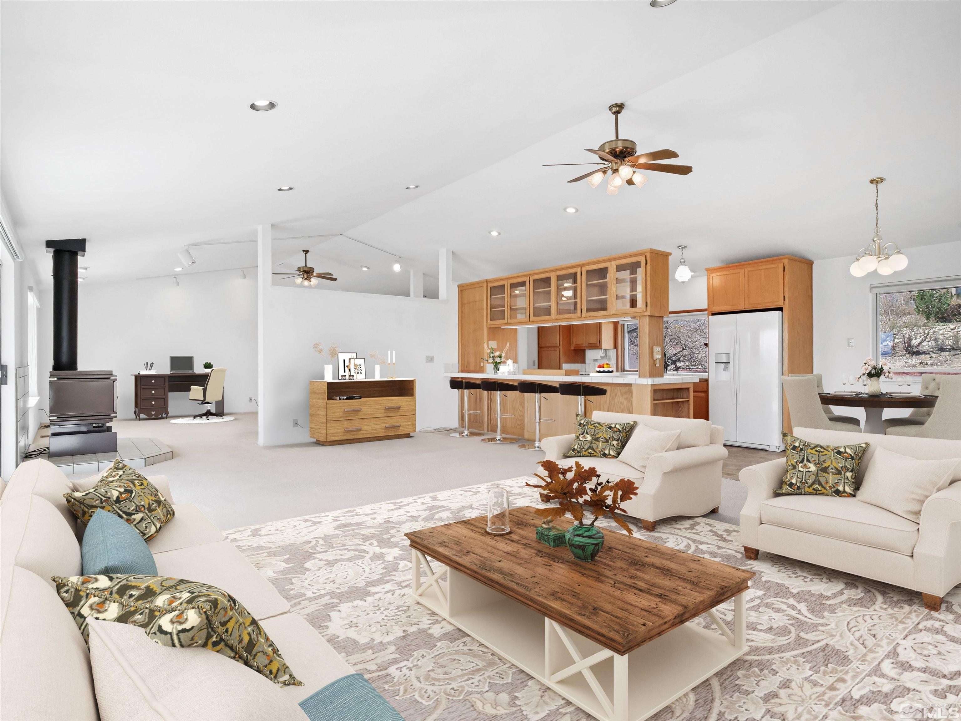 875 Bollen Circle Gardnerville, NV 89460 - Photo 7 of 26 a living room with furniture and a rug