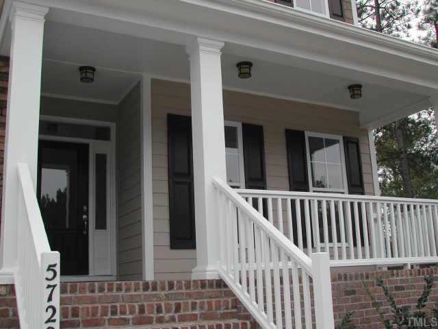 5720 Spring Glen Lane Raleigh, NC 27616 - Photo 3 of 12 Nice size porch, great for rocking chairs