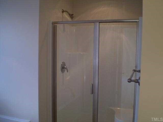 5720 Spring Glen Lane Raleigh, NC 27616 - Photo 10 of 12 Master bathroom with separate tub and shower