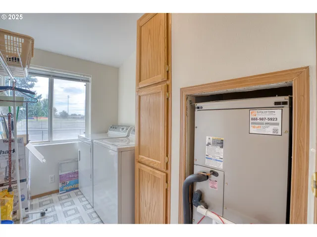 a bathroom with a toilet sink and a shower